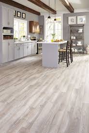 Flooring america is a division of cca global partners, the nation's largest floor covering cooperative. Light Grey Hardwood Floors Gray Tones Mixed With Light Creams And Tans Suggest A Floor Worn Wood Floor Kitchen Flooring Grey Flooring