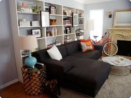 Sofa table with shelves are essential pieces in the living room and the design of the family room. Bookcases Behind Sofa Bookcase Behind Sofa Living Room Shelves Small Apartment Living