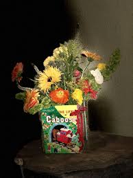 Create This Children S Book Vase Using Two Golden Books The Same Size Remove The Pages Drill Holes Every Baby Shower Fun Baby Shower Centerpieces Baby Shower