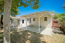 A backyard cabana creates a fantastic outdoor laundry. Back Patio With View Of Laundry Room Conveniently Located Just Outside The Kitchen Door The Sister Team