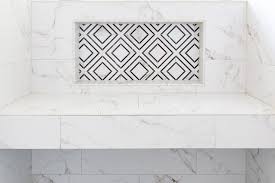 Black And White Geometric Bathroom Tiles Black And White Geometric Tiles Accent A Shower Niche Famed By Honed White And Gray Surround Tiles And Posi Shower Niche Black And White Marble Geometric Tiles