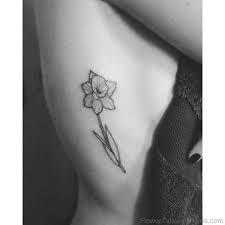 Small Daffodil Tattoo On Rib Daffodil Tattoo Daffodil Flower Tattoos Tattoos