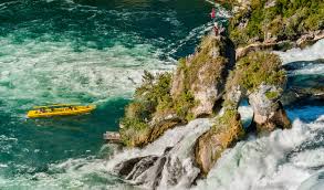 They are 150 metres wide and 23 metres high. Wallpaper Rhein Rheinfall Waserfall Rhyfall Neuhausen Schweiz Europa Europe Boot Schaffhausen Rhinefalls Switzerland Leicam M8 50mm Summicron Flus River Felsen Rock Rhine Water Fall Waterfall Wasser Leice Leica 3740x2199