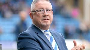 Gillingham and Paul Scally fined £75k each for 'race victimisation'
