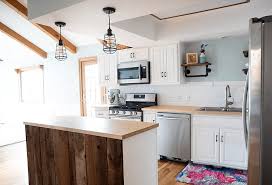 The kitchen just did not match the rest of the house, as you can see in the picture below. How Do Painted Cabinets Hold Up Over Years Of Use Bungalow 47
