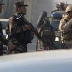 Suicide bombers kill dozens Shi'ite
