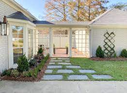 Here's a before and after from one of my exterior edesign clients. White Painted Brick House Edesign Before After Edesign