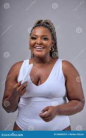 Cheerful Plus Size or Plump Woman with Chubby Natural Body Holding Napkin,  Posing Stock Photo - Image of plus, natural: 240683572