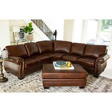 Dial in the adjustable headrest to your preferred height and angle, pull up the matching footrest and enjoy! Isabelle Top Grain Leather Sectional And Ottoman Costco