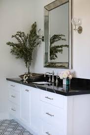 Nature white, black, green, red, marble countertop vanity top for bathroom. Beaded Beveled Mirror With Black Marble Like Countertop Transitional Bathroom
