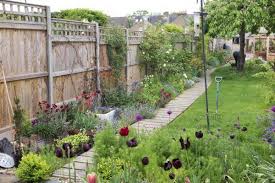 Shed Landscaping Tips From The Experts Narrow Garden Sloped Garden Unique Gardens