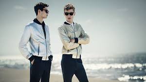 From light blue to navy, the most popular blue bomber jacket outfit combines ripped skinny jeans, a shirt, white shoes, and your favorite top. How To Wear A Bomber Jacket With Style The Trend Spotter