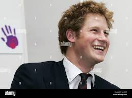 Prince harry smiles as he meets the winners of the wellchild health award  during the children health awards ceremony, london. hi-res stock  photography and images