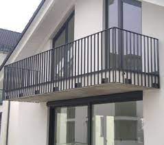 A glass balcony railing in this style lends itself perfectly to french doors. Img5g Stair Railing Ideas Img5g Balcony Railing Design House Fence Design Stair Railing