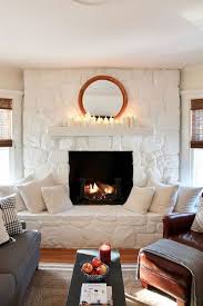 The only tutorials online i have a stacked rock fireplace to the ceiling and love it, no mortar. Whitewashing A Stone Fireplace With Grey Paint Land Of Laurel
