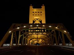 Trying to photograph a city scape after sunset it's a bit tricky but not impossible. Picture Of The Tower Bridge At Night Sacramento