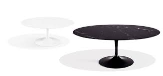 Saarinen low coffee table round tulip lounge with base (piedistallo) in fusion of white or black lacquered aluminum and floor available in liquid laminate or marble in different finishes. Saarinen Coffee Table Knoll
