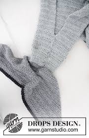 Choose between two options for a kids shark blanket: Shark Attack Blanket Drops Children 28 13 Free Crochet Patterns By Drops Design