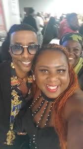 Audience Rash Evans” X Is in The Background at The Right in The Video