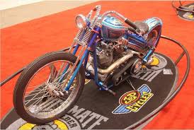 Bill Steele With Blue Baller A Pan Shovel That Features A Smoothed Chassis Foot Clutch Jockey Shift And A Rebuilt Pow Harley Bobber Bike Builder Cool Bikes