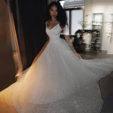Jedoch wer hat schon vergnügen. Grosshandel Dhl Glanzende Pailletten Spaghetti Riemen A Line Hochzeitskleid Brautkleider Sexy Bling Perlen Spitze Applique High Hals Illusion Lange Armel Meerjungfrau Kapelle Brautkleider Von Allanhu 123 43 Auf De Dhgate Com Dhgate
