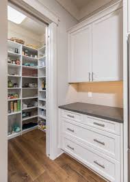 Kitchen Pantry With Adjustable Shelves And A Wine Rack White Cabinets In A Shaker St Kitchen Pantry Cabinets Custom Built Kitchen Cabinets Adjustable Shelving