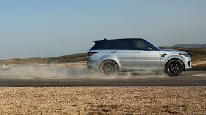 A man wearing a face mask while driving in. Does Sport Mode Really Do Anything