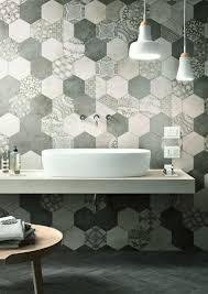 For a classic look, try an allover hexagon tile floor in a solid color in your bathroom or a hexagon mosaic backsplash in your kitchen. Bathroom Decoration Ideas With Hexagonal Tiles Marazzi