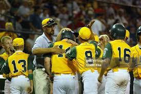 Aaron Alvey of the Great Lakes team is congratulated by teammates... News  Photo