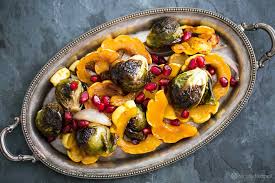 Maple Glazed Roasted Delicata Squash And Brussels Sprouts Recipe Simplyrecipes Com Recipe Delicata Squash Brussel Sprouts Recipes