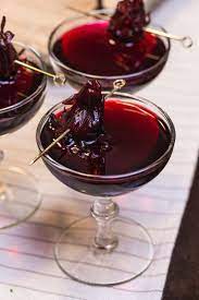 Hibiscus Martini Served Super Chilled And Garnished With A Candied Hibiscus Flower These Hibiscus Martinis Hibiscus Cocktail Hibiscus Drink Hibiscus Recipe