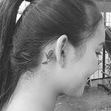 Meet Jon Boy And His Minimalistic Micro Tattoos Tattoo Behind Ear Bird Tattoo Behind Ear Trendy Tattoos