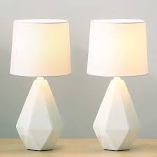 The juna ceramic table lamp adds a touch of tonal and textural sophistication to your tabletop. 30 Ceramic Table Lamps To Elevate Your Space Architectural Digest In 2021 White Bedside Lamps Bedside Table Lamps Modern Table Lamp