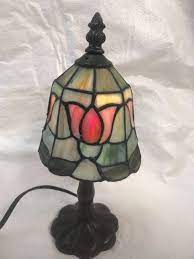 We specialize in stained glass hanging lamps, stained glass chandeliers, stained glass accent lamps, antique stained glass lamp replicas and tiffany stained glass lamps. Stained Glass Accent Lamp Tiffany Style Victorian Bedside Nightlight Small Accent Lamp Tiffany Style Lamp