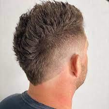 The hairstyle is unique as one can dye or bleach the top hair with an etched design of two lines in the backside. 50 Best Mohawk Fade Haircuts For Men 2021 Guide