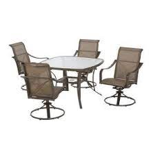 The chairs are made of aluminum and steel with a round swivel base and arm rests. Outdoor Dining Set With Swivel Rocking Chairs 379 00 Martha Stewart Patio Furniture Modern Patio Furniture Wicker Patio Furniture
