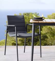 Chair comes with a loose seat cushion w/ zipper closure. Core Arm Chair In 2021 Contemporary Outdoor Furniture Outdoor Chairs Outdoor Dining Chairs