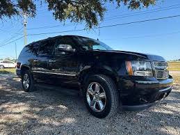 Image result for Black Granite 2012 Suburban