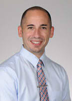 Dr. Travis R. Benzing, MD