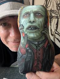 Silly me…The other day I posted a picture of the Ted Lasso figure I bought  and today I'm just now realizing that he has a little pink box in his hand…  BISCUITS