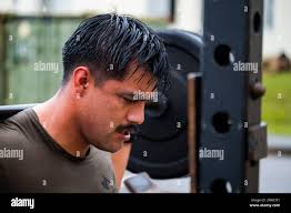 Weighted squats hi-res stock photography and images