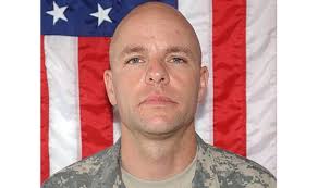 A family of both blood and Army sees their fallen receive the nation's  highest honor