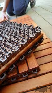 There is no other material like wood! We Installed Interlocking Deck Tile Over Our Old Deck Interlocking Deck Tiles Deck Tile Deck Tiles