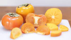 What do persimmons look like? How To Eat Persimmons Persimmon Taste Test Youtube