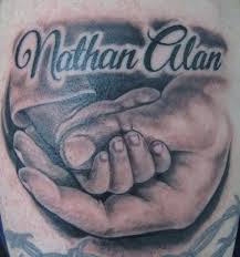 View more tattoos designs, tattoo pictures. Jen S Baby Boy Holding Baby Baby Hands Portrait Tattoo