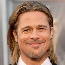 Headshot of american actor brad pitt with long, dyed blonde hair, wearing an open collared blue sorry, your search returned zero results for brad pitt blonde. The Best Brad Pitt Haircuts Hairstyles 2021 Update