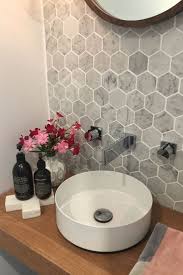 Chifley House In Canberra Australia Designed By Studio Black Interiors This Stylish Powder Room Embraces Und Bathroom Layout Honeycomb Tile Beautiful Bathrooms