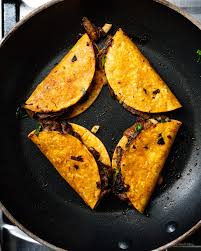 Immediately top the tortilla with the shredded oaxaca cheese. Birria Tacos Recipe I Am A Food Blog