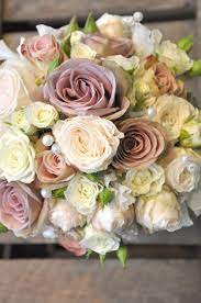 The Wedding Bouquet Contained Soft Amnesia Roses Combined With Bombastic Spray Roses Queue The Inevitable Renditions Of The Song Rebecca S Flowers Vinta