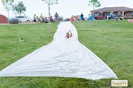 For an ultimate backyard water bonanza, create. How To Build A Huge Slip N Slide Fun For All Ages All Things Thrifty